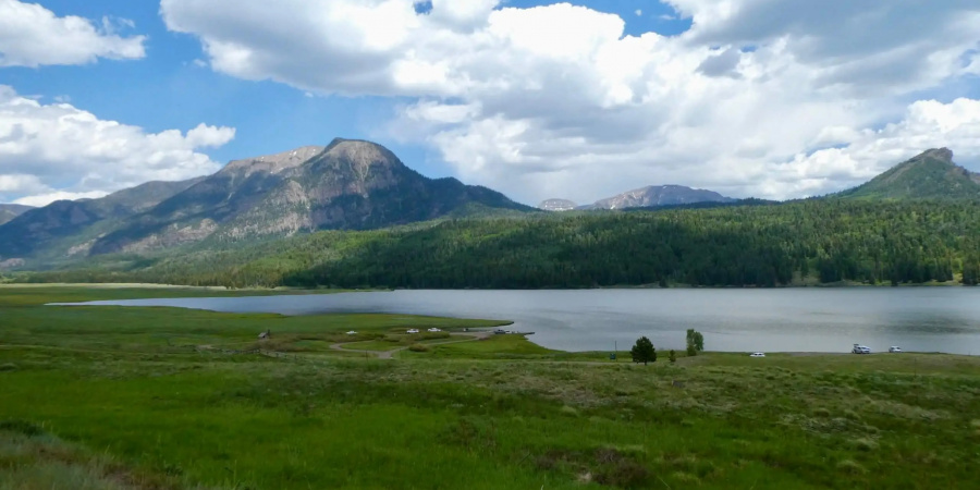 Williams Creek Reservoir with the San Juan Mountains in the distance.